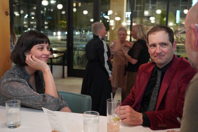 Musicians and Business owners chattin