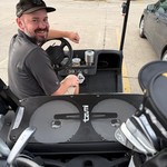 Carson brought a little Bluetooth speaker to golf today.