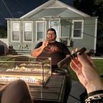 Cigar hangs in the back yard