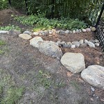 Landscaping - More boulders to try to help with the erosion…