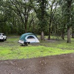 Camping - Jeff went to change and the storm stranded him in his tent.