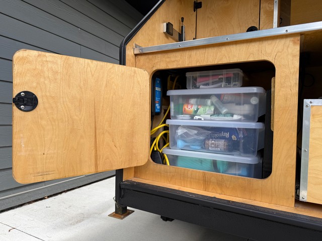 This pantry is nice and big, but having to pull these planos out every time we need something is ...