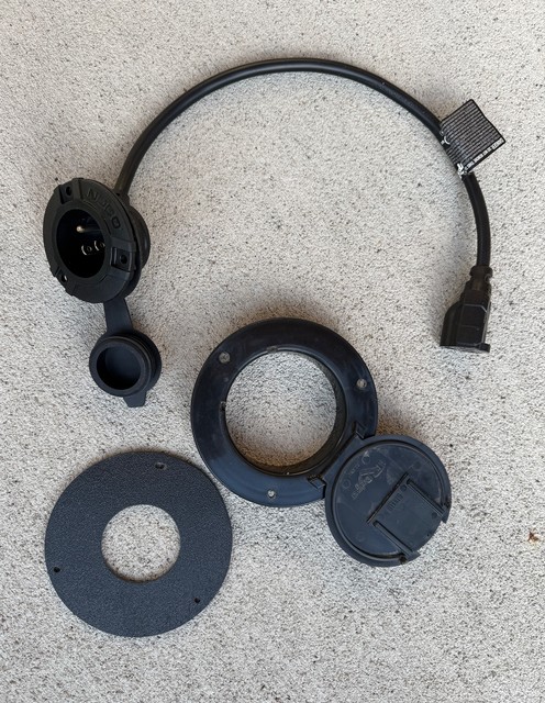 Modified the original passthrough and created a mount for the Noco plug to fit inside